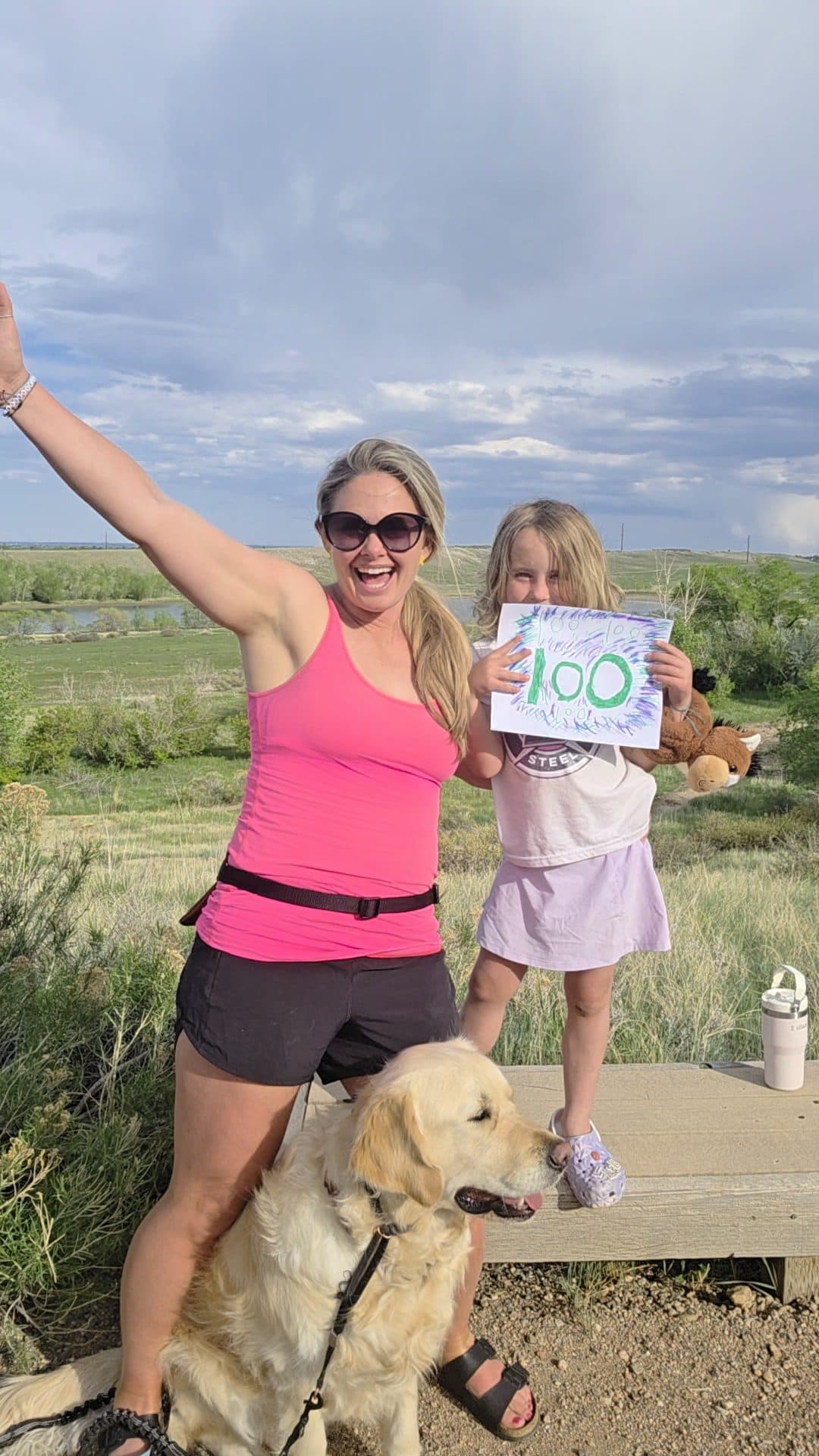 Sarah and her daughter celebrating their hundredth hike of the year.
